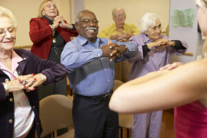 bigstock_Senior_adults_in_a_stretching__13894499